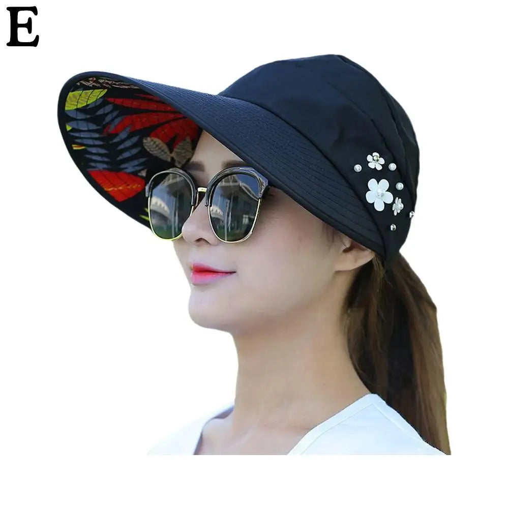 "Stijlvolle anti-UV strandhoed dames, brede rand, opvouwbaar, lichtgewicht polyester, effectieve zonbescherming."