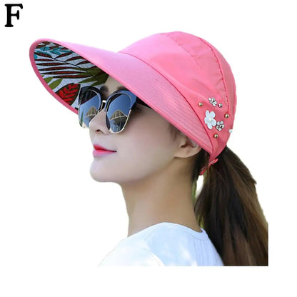 "Stijlvolle anti-UV strandhoed dames, brede rand, opvouwbaar, lichtgewicht polyester, effectieve zonbescherming."