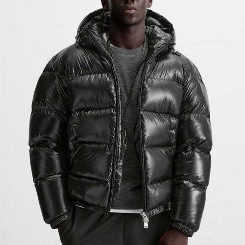 "Stijlvolle effen pufferjas voor mannen, strak minimalistisch design, comfortabele pasvorm en zijzakken, ideaal voor winterda