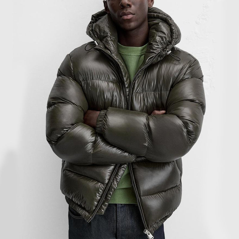"Stijlvolle effen pufferjas voor mannen, strak minimalistisch design, comfortabele pasvorm en zijzakken, ideaal voor winterda