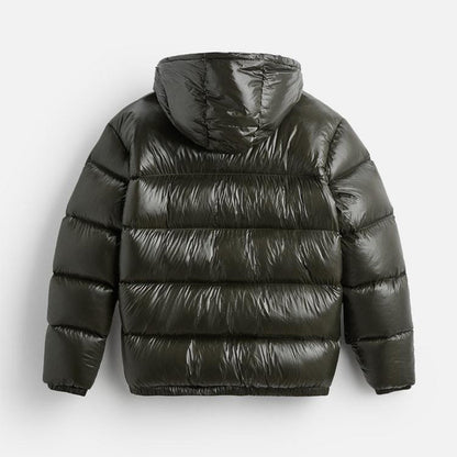 "Stijlvolle effen pufferjas voor mannen, strak minimalistisch design, comfortabele pasvorm en zijzakken, ideaal voor winterda