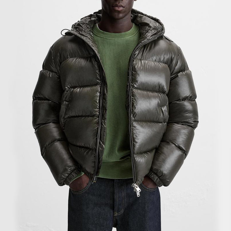 "Stijlvolle effen pufferjas voor mannen, strak minimalistisch design, comfortabele pasvorm en zijzakken, ideaal voor winterda