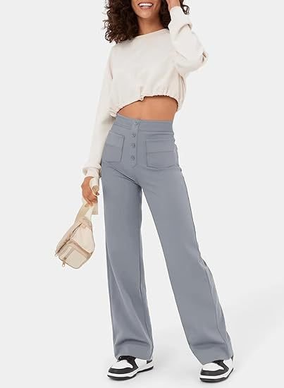 "Stijlvolle elastische hoge taille broek voor dames met rechte pijpen, decoratieve knopen en ruime zakken, ideaal voor elke g