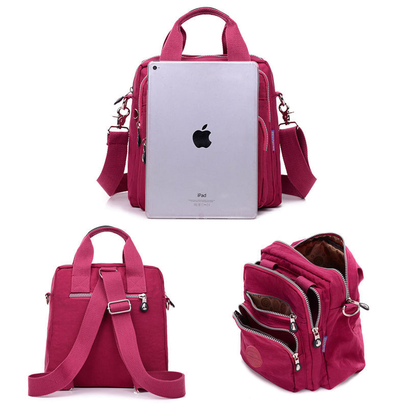 "Stijlvolle en praktische waterdichte nylon crossbody tas in zwart, met meerdere vakken en 3-weg gebruiksopties."
