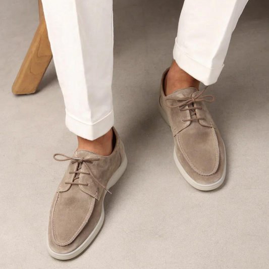 "Stijlvolle heren suède instappers, elegante afwerking en comfortabele pasvorm, ideaal voor zowel zakelijk als casual gebruik