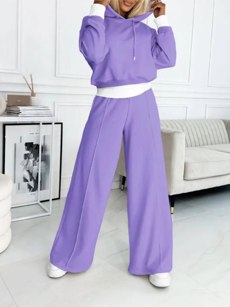"Stijlvolle jogging loungeset vrouwen, luxe tweedelig outfit met wrap-crop hoodie en broek met brede pijpen in heather-stof."