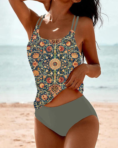 "Stijlvolle Nadine Tankini met kleurrijke print en dubbele bandjes, ideale damesbadmode voor comfort en mode op zomerdagen."