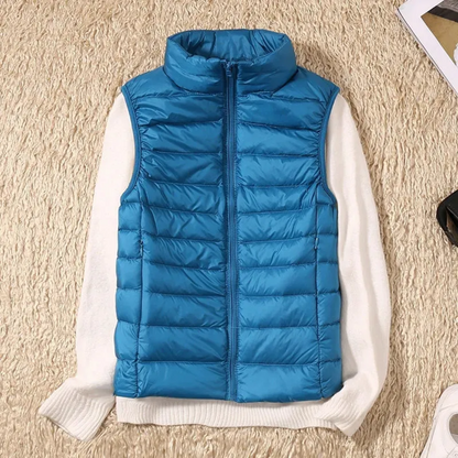 "Stijlvolle winddichte dames bodywarmer in rood, lichtgewicht met slank design, geschikt voor elke modebewuste vrouw."