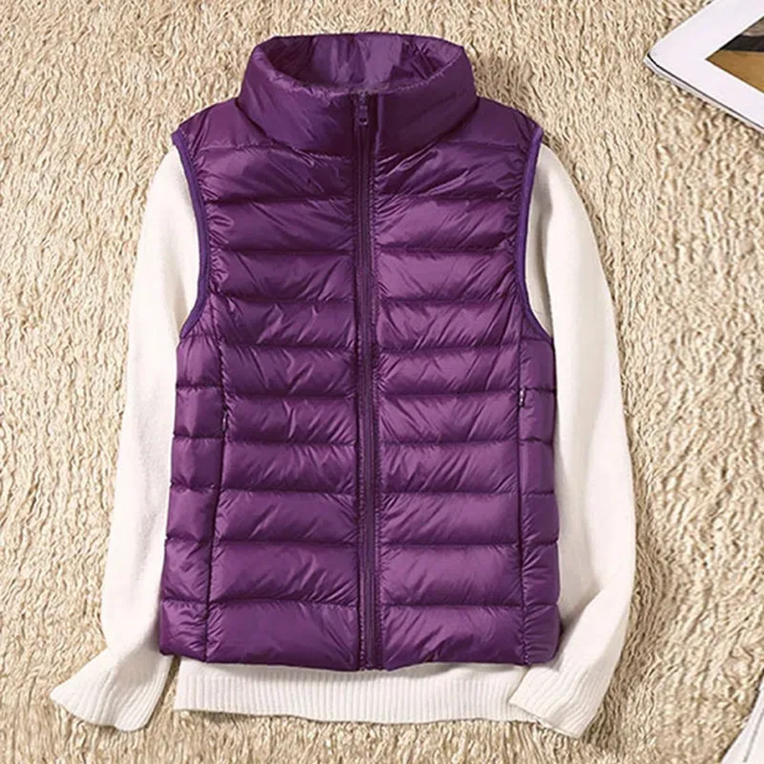 "Stijlvolle winddichte dames bodywarmer in rood, lichtgewicht met slank design, geschikt voor elke modebewuste vrouw."