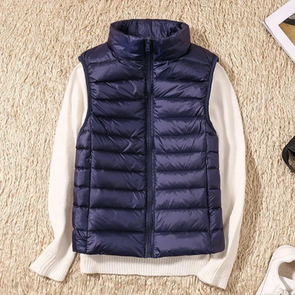 "Stijlvolle winddichte dames bodywarmer in rood, lichtgewicht met slank design, geschikt voor elke modebewuste vrouw."
