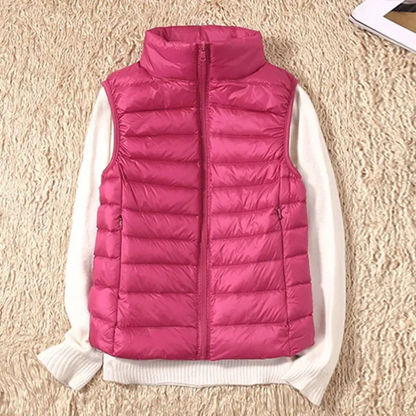 "Stijlvolle winddichte dames bodywarmer in rood, lichtgewicht met slank design, geschikt voor elke modebewuste vrouw."