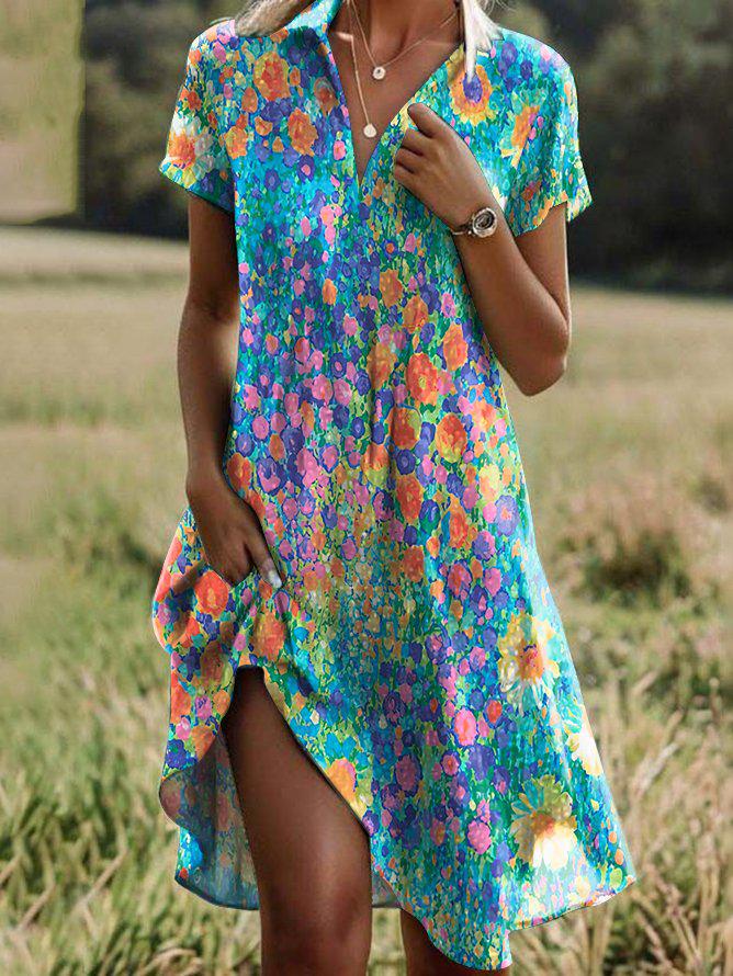 "Stijlvolle zomerjurk met V-hals in Turkoois. Elegante midi-stijl, perfect voor zowel stranddagen als avondjes uit."