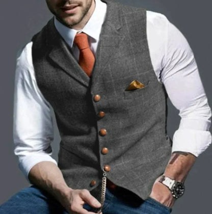 "Stylisch herenvest, klassiek patroon, duurzame tweed stof, geschikt voor formele en casual gelegenheden."