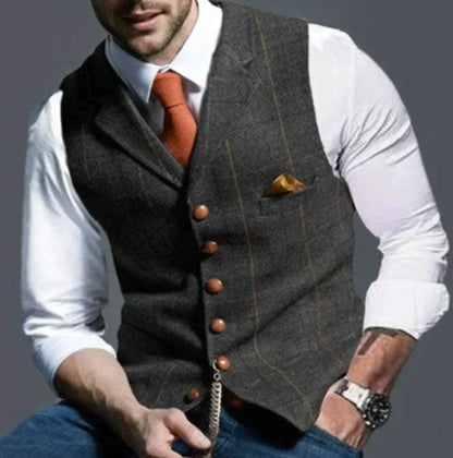 "Stylisch herenvest, klassiek patroon, duurzame tweed stof, geschikt voor formele en casual gelegenheden."