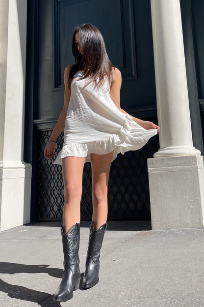 "Trendy bruine cowboy laarzen voor dames met puntige neus, kniehoge stijl en subtiele western stiksels, ideaal voor herfst."