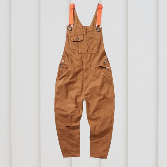 "Tuin dungarees in groen, verstelbare schouderbanden, comfortabel en ademend materiaal, ideaal voor dagelijks tuinieren."