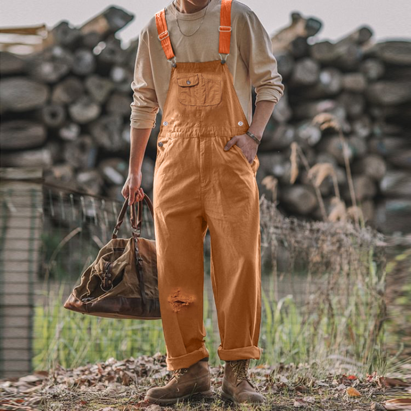 "Tuin dungarees in groen, verstelbare schouderbanden, comfortabel en ademend materiaal, ideaal voor dagelijks tuinieren."