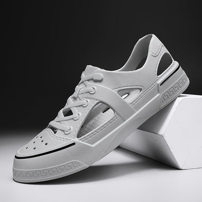 "Ultralichte uniseks waterschoenen voor strand, ademend ontwerp, lichtgewicht, zwart met oranje accenten, antislipzool."