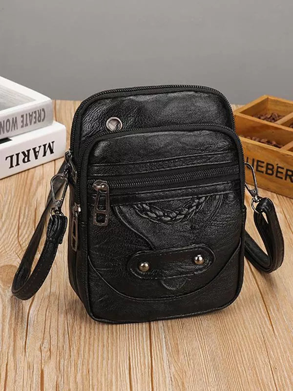 "Vintage leren schoudertas Jaida met verstelbare riem en stijlvolle envelopsluiting voor dames, duurzame luxe tas"