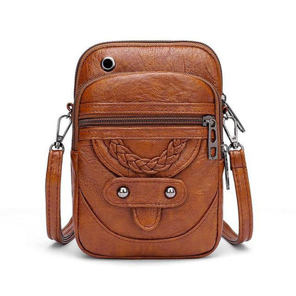 "Vintage leren schoudertas Jaida met verstelbare riem en stijlvolle envelopsluiting voor dames, duurzame luxe tas"