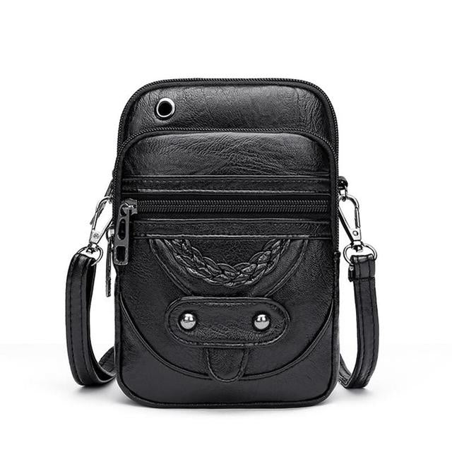 "Vintage leren schoudertas Jaida met verstelbare riem en stijlvolle envelopsluiting voor dames, duurzame luxe tas"
