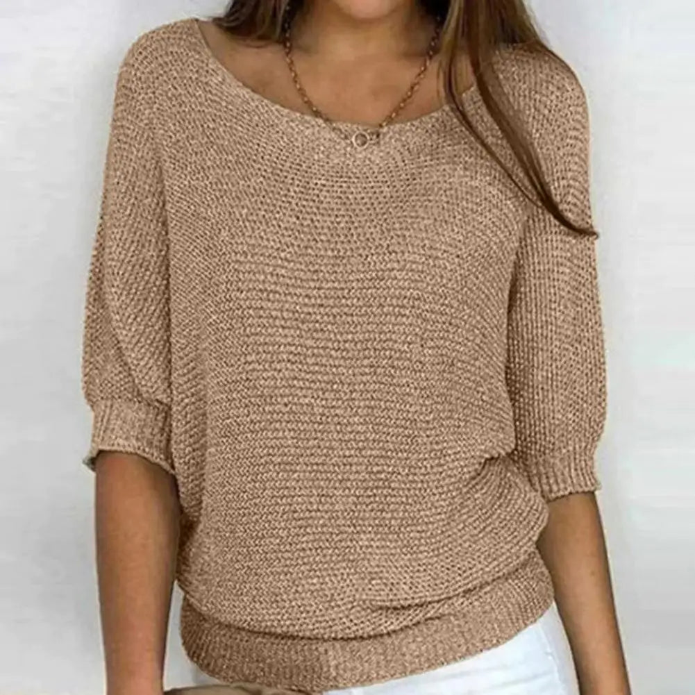 "Warme, gebreide damestrui met vlindermouwen, zachte stof, modieuze look, perfect voor herfst en winter."