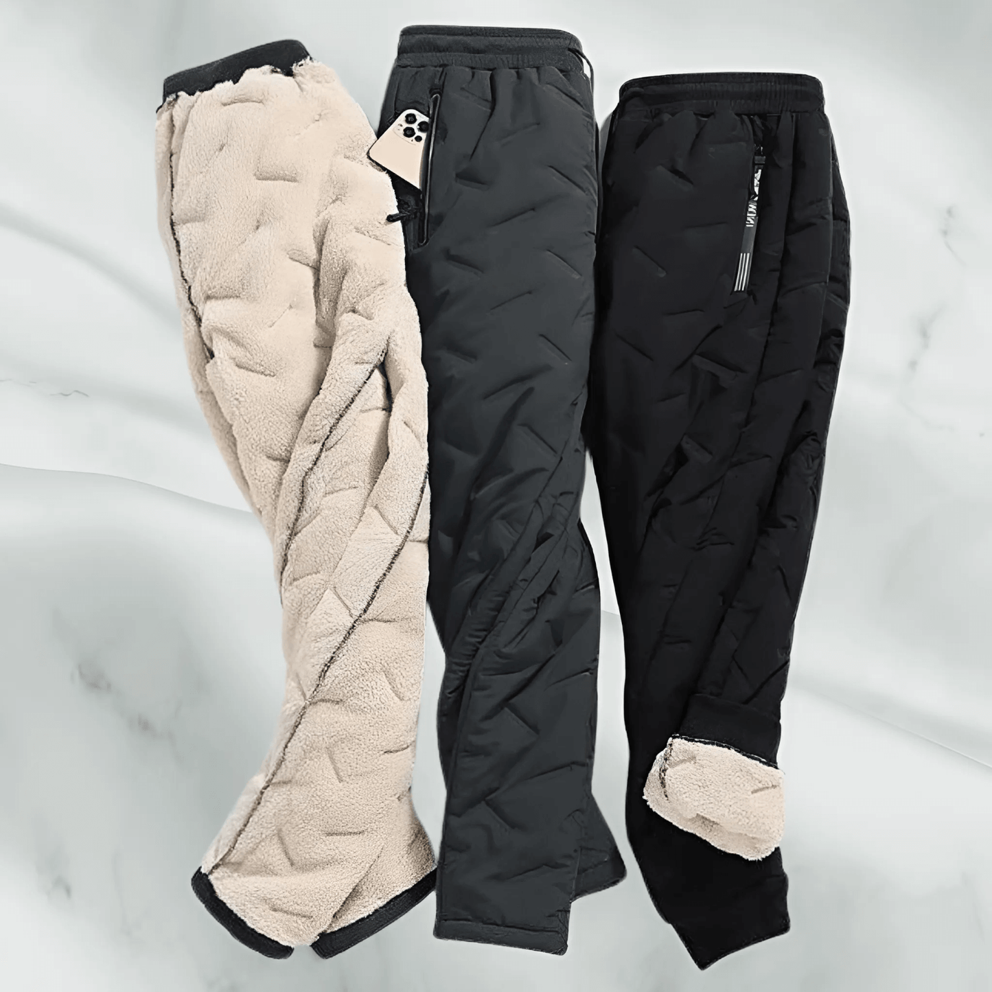 "Waterdichte en winddichte thermobroek heren met fleecevoering, grijs, voor winterse activiteiten."