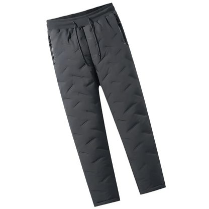 "Waterdichte en winddichte thermobroek heren met fleecevoering, grijs, voor winterse activiteiten."