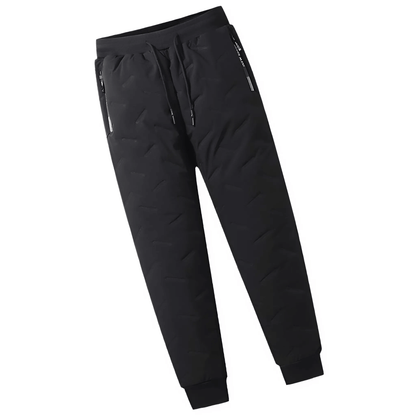 "Waterdichte en winddichte thermobroek heren met fleecevoering, grijs, voor winterse activiteiten."