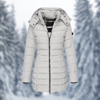 "Waterdichte winterjas in beige, robuust en stijlvol ontwerp, ideaal voor alle weersomstandigheden, dameskleding."