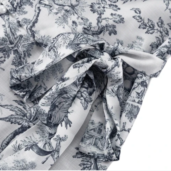 Zomers jurkje met pofmouwen en plissé rok, elegant en comfortabel, perfect voor elke gelegenheid, ademende stoffen.