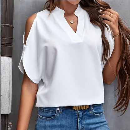 "Zomerse blouse dames met korte mouwen, slanke pasvorm, licht en ademend materiaal voor casual chique look."