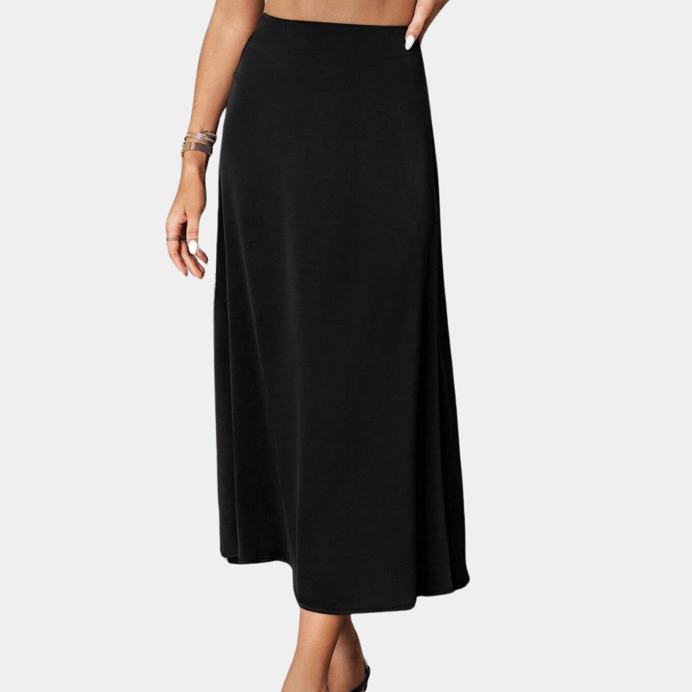 Zwarte elegante zomerrok voor dames met vloeiende lijnen, ideaal voor diverse gelegenheden, benadrukt het vrouwelijke silhoue