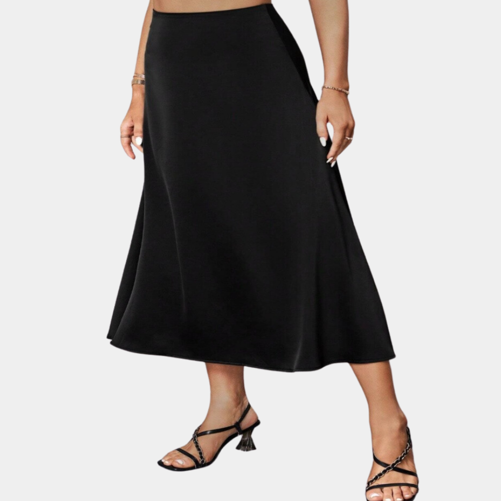Zwarte elegante zomerrok voor dames met vloeiende lijnen, ideaal voor diverse gelegenheden, benadrukt het vrouwelijke silhoue
