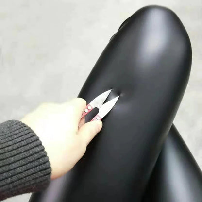 "Zwarte leren thermo legging voor dames met warme fleece voering, strakke pasvorm en elegante uitstraling voor koud weer."