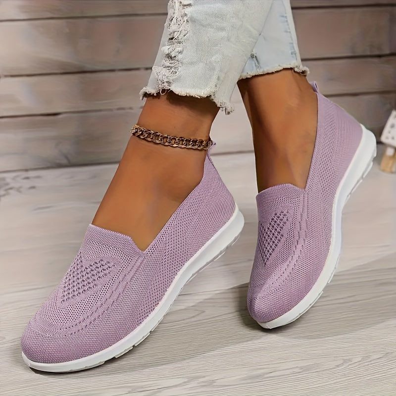 "Zwarte orthopedische dames instappers, elegant ontwerp, ademend bovenwerk, slip-on stijl, ideaal voor comfort en steun."