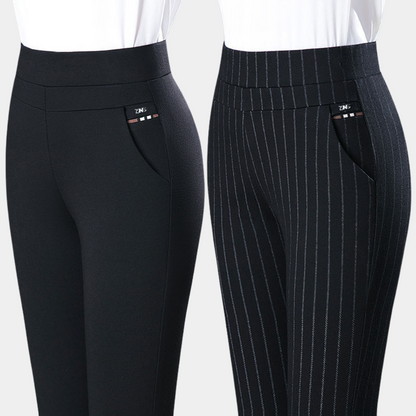 "Zwarte stretchbroek voor dames met hoge taille, flatterend en comfortabel, perfect voor werk en casual looks."